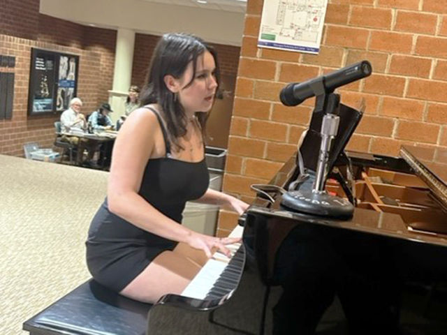 Maddy Colello performs an original song.