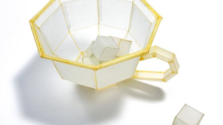 Artwork by Jennifer Seo: A paper recreation of a sugar bowl and sugar cubes