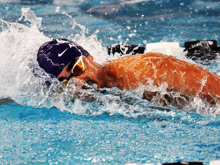 Penn State Altoona student-athlete Adam Marawn competing in a swim meet