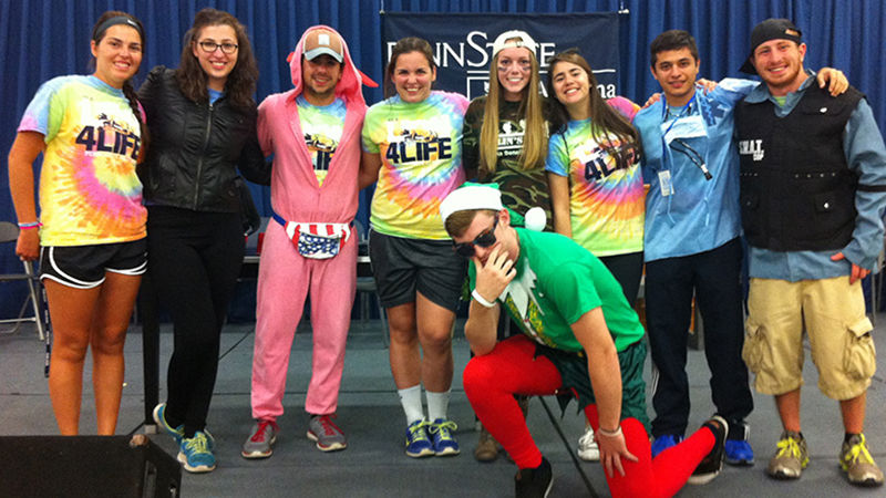 Delsite (second from left) poses with some of her Orientation Leader friends at the Freshman Follies.