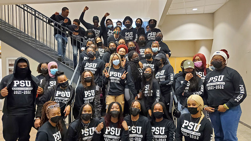 Some members of the BSU organization gathered after a meeting to show off their new apparel.