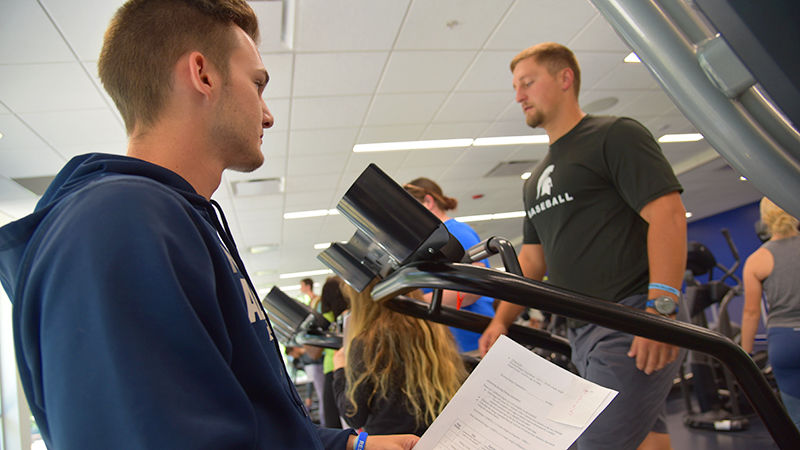 Hunter Breon (left) and Richard Carey (right) participate in an exercise physiology lab.
