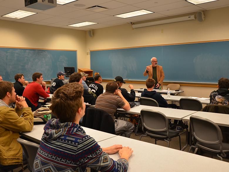 Dr. Bill White teaching a communications class
