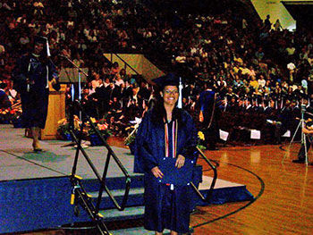Fisher receives her diploma in 2010. 