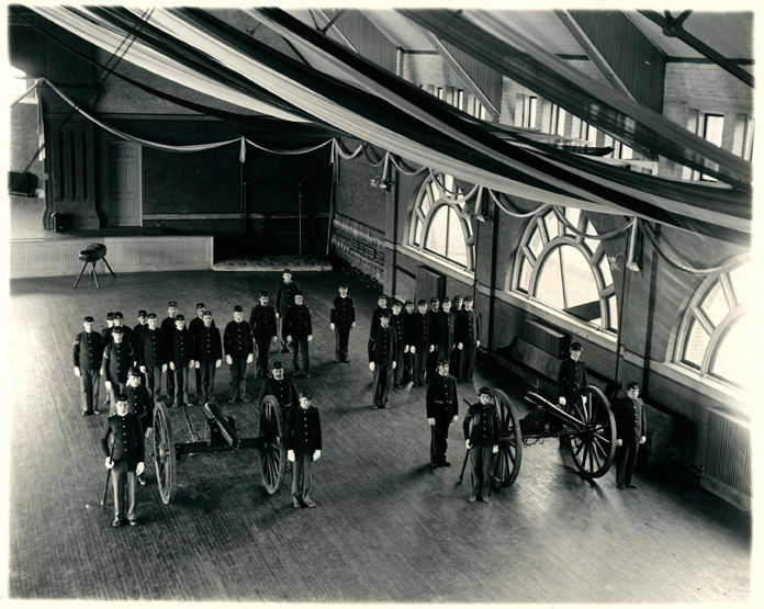 Cadets stand in the Armory in 1894