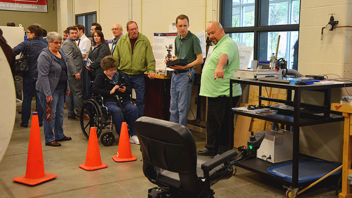 Faculty and students demonstrate the Independence project wheelchair