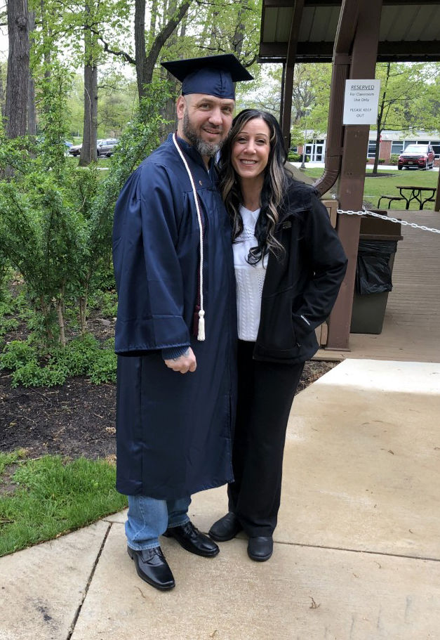 Steve Farella with his wife Christi on graduation day in spring 2021