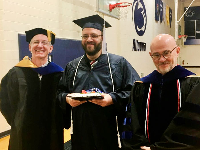 Fall 2022 graduate Jim Miller with history faculty members Mark McNicholas and Doug Page