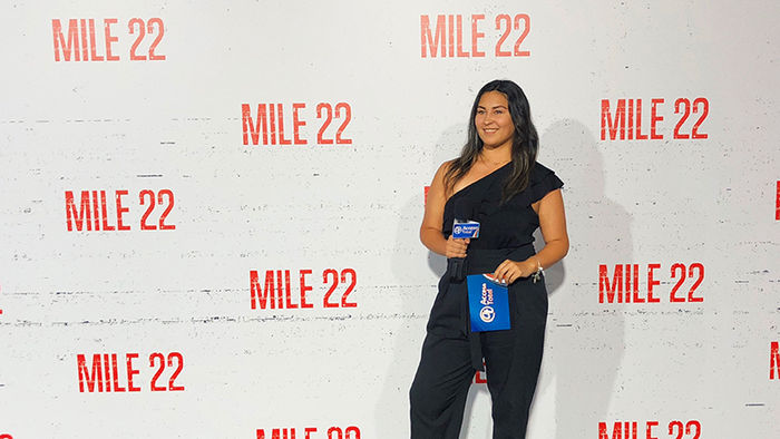 Catherine Rivera Chardon works the room at the Mile 22 premiere for Acceso Total