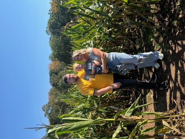 Michael Balmford with wife Allison and son Noah at a corn maze this year