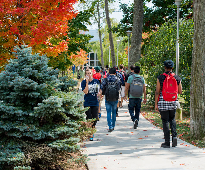 Students walk to and from class on campus