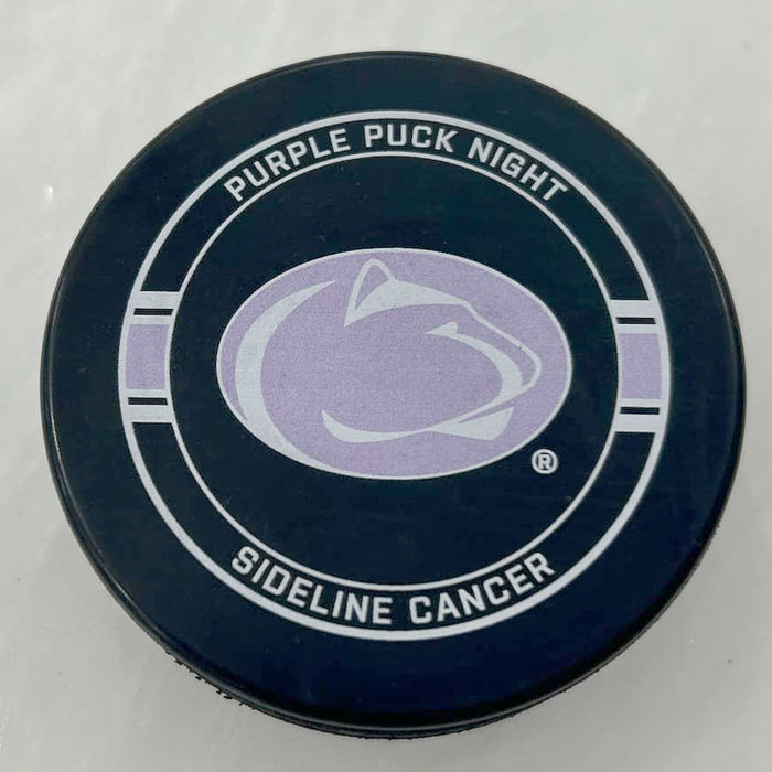 The Purple Puck event’s commemorative game puck.