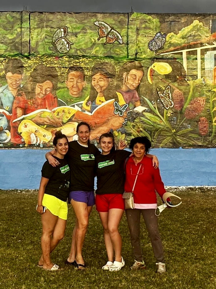 Leah Klevan, Pam Snyder, Cierra Rhodes, and Anju Jolly with the final mural