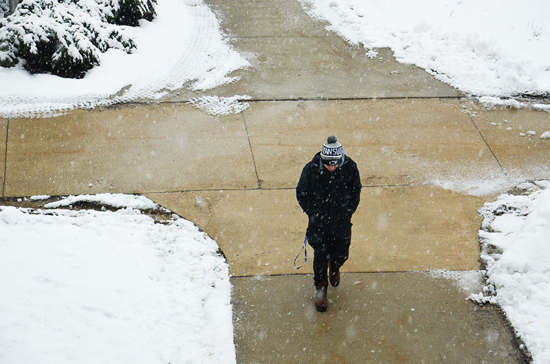 a student walks on campus