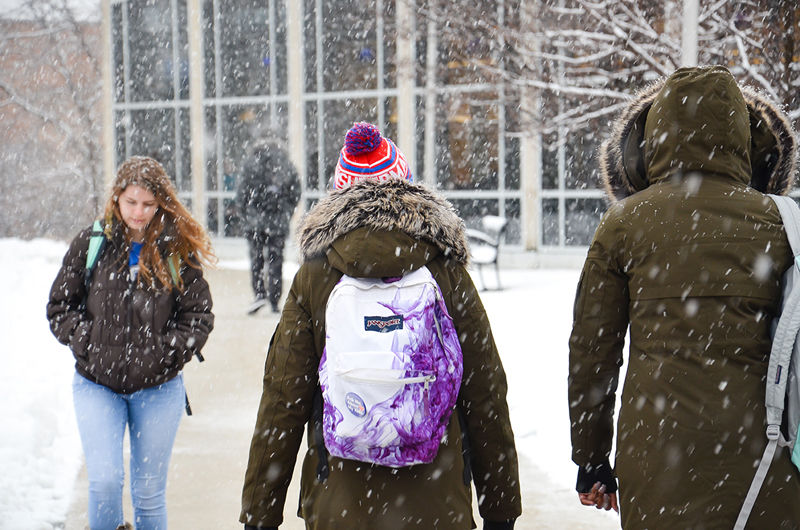 Students walk past Eiche library