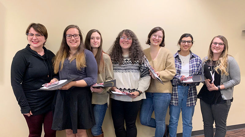 Senior English students pose for a photo