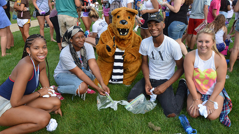 First year students pose with the Nittany Lion at the Friends for Life event.