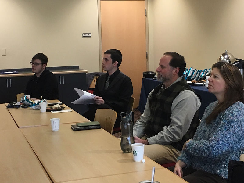 Faculty and students observe English senior seminar presentations