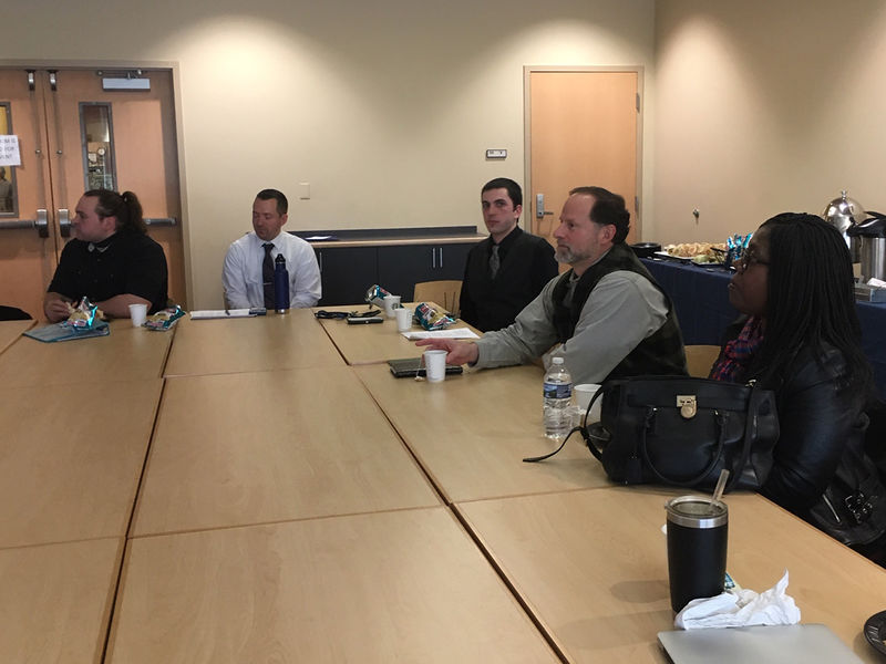 Faculty and students observe English senior seminar presentations