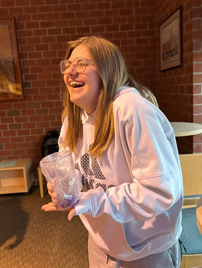 Sidney Brown enjoys her victory at the Honors Program Jeopardy night.