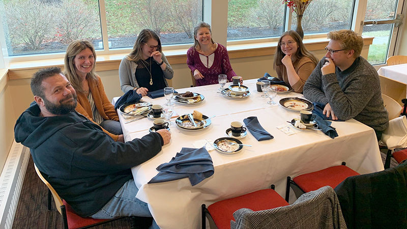 Students, faculty, and families enjoying lunch