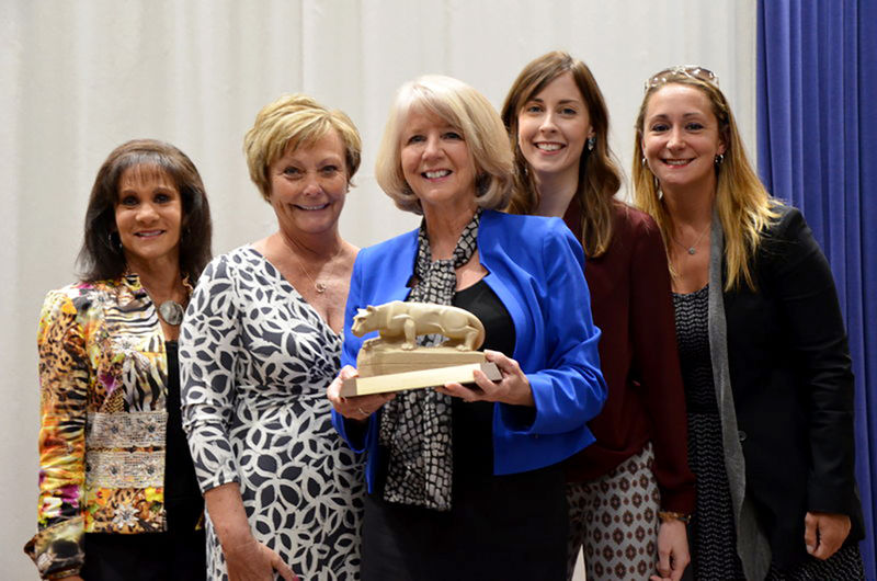 Denise Mason (center) and the staff of the office of development and alumni relations