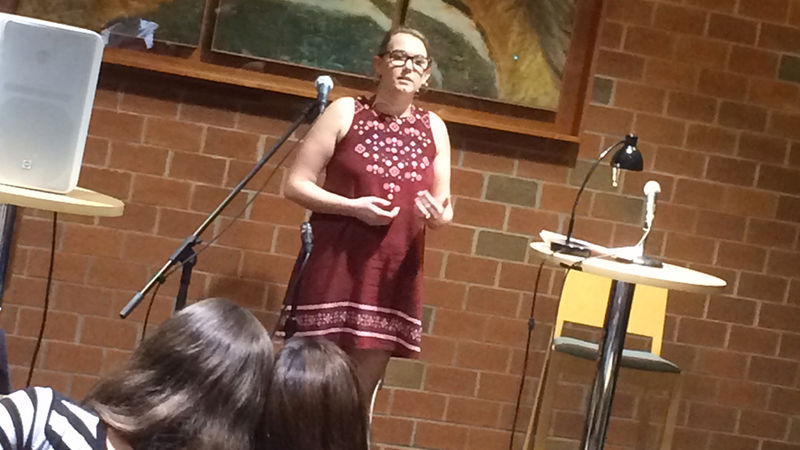 A student reading at the spring 2018 Hard Freight Cafe