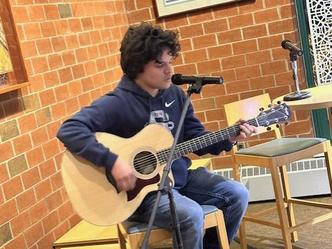 Student Josue Barahona-Rosales performs a song by Ed Sheeran.