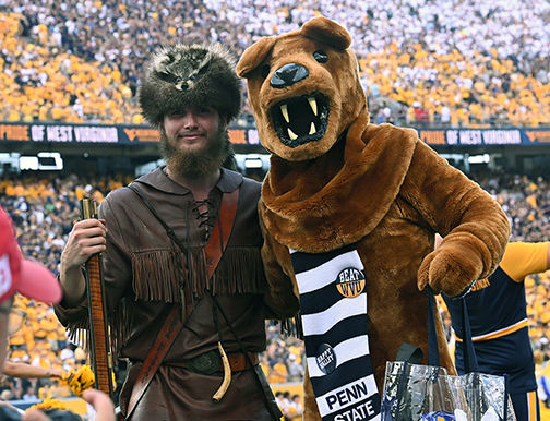 The Nittany Lion poses with the Mountaineer