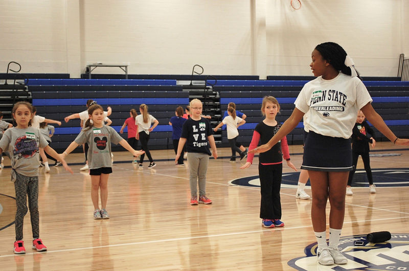 Penn State Altoona cheerleaders run a mini cheer clinic