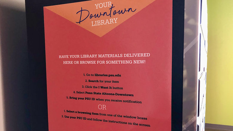 vertical sign titled "Your Downtown Library" with a list of user instructions