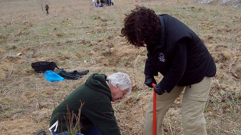 Joe Pizarchik planting trees with Lori Bechtel Wherry, Chancellor and Dean of Penn State Altoona