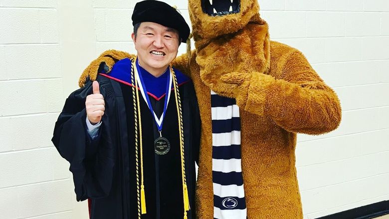 Ryoo with campus Nittany Lion mascot