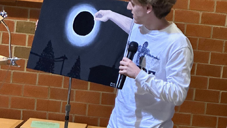Student Talon McKendree shares an original painting.