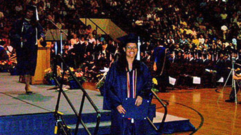 Fisher receives her diploma in 2010. 