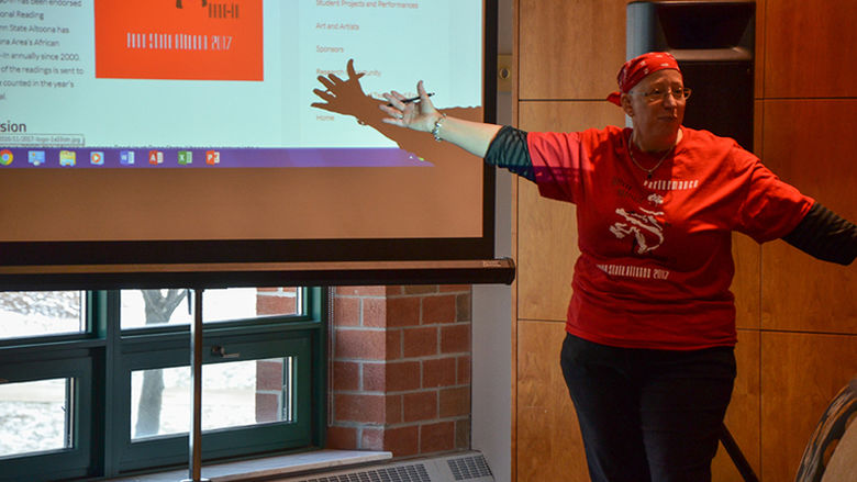 Faculty member Robin Reese presents at the 2017 African American Read-In