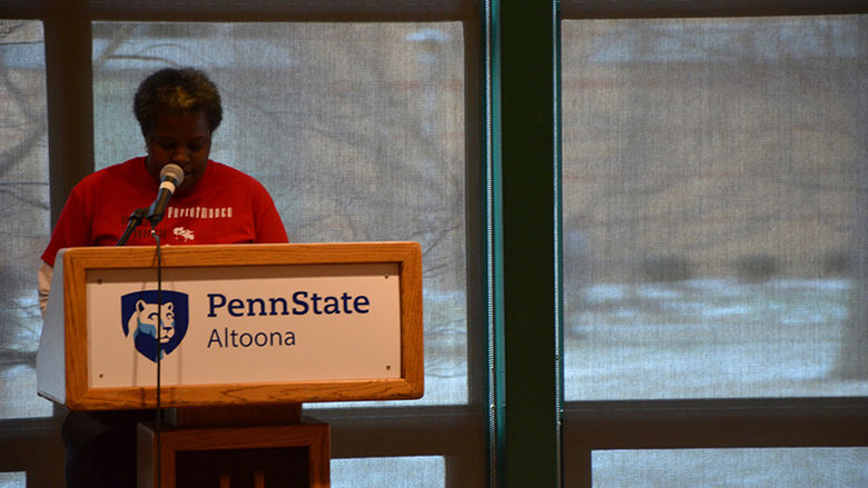 Staff member Harriet Gaston presents at the 2017 African American Read-In