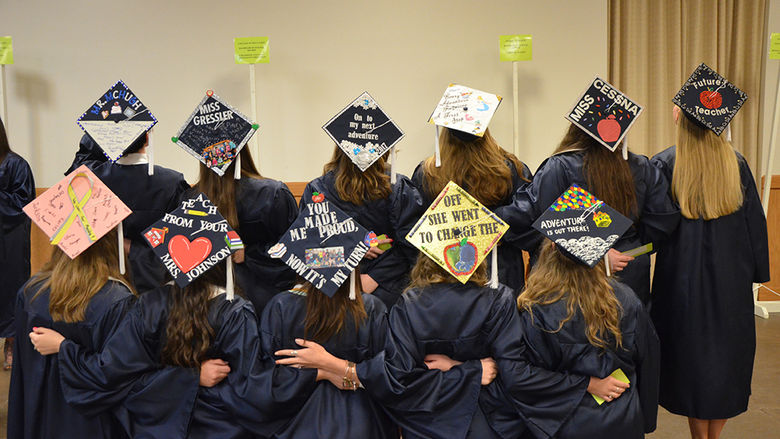 Students who off their cap decorations