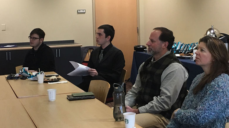 Faculty and students observe English senior seminar presentations