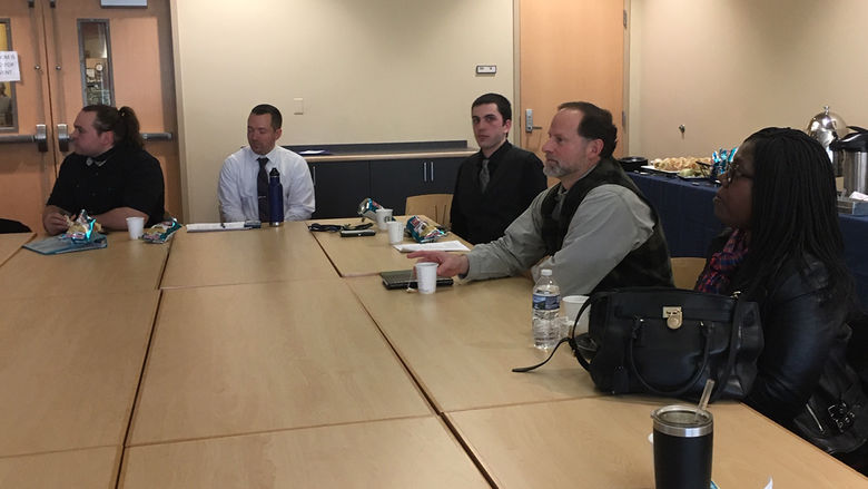 Faculty and students observe English senior seminar presentations