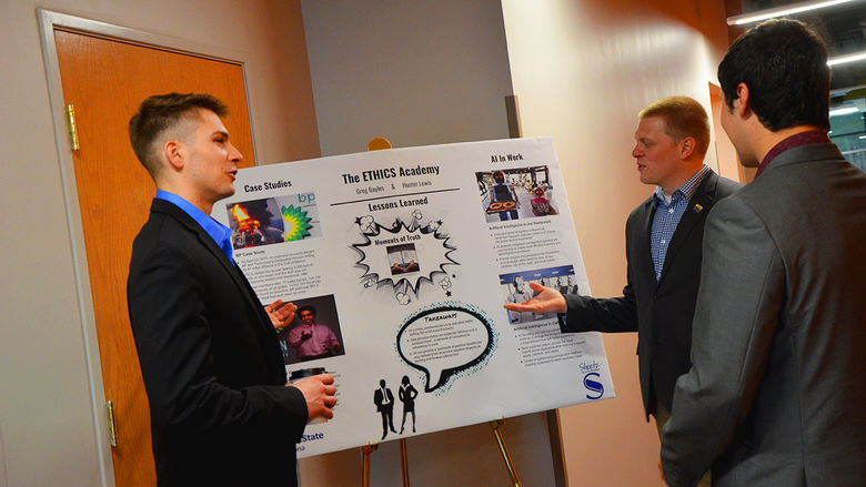 Business students discuss their internship experiences.