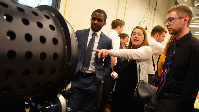 Engineering students present demonstrations of their projects.