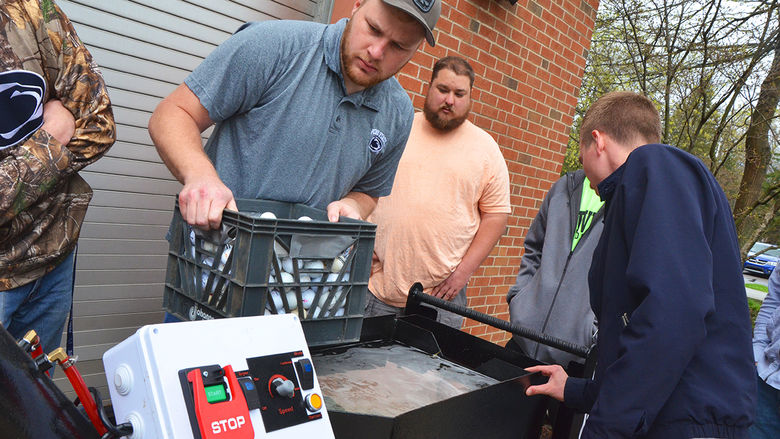 Engineering students present demonstrations of their projects.
