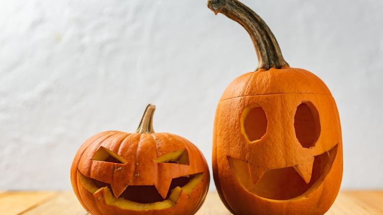 Two jack-o-lanterns with silly faces