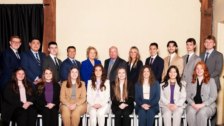 The 12th class of Sheetz Fellows pose for a photo with Steve and Nancy Sheetz and faculty member Donna Bon