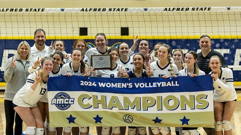 Penn State Altoona women's volleyball team poses for a photo after winning the 2024 AMCC Championship