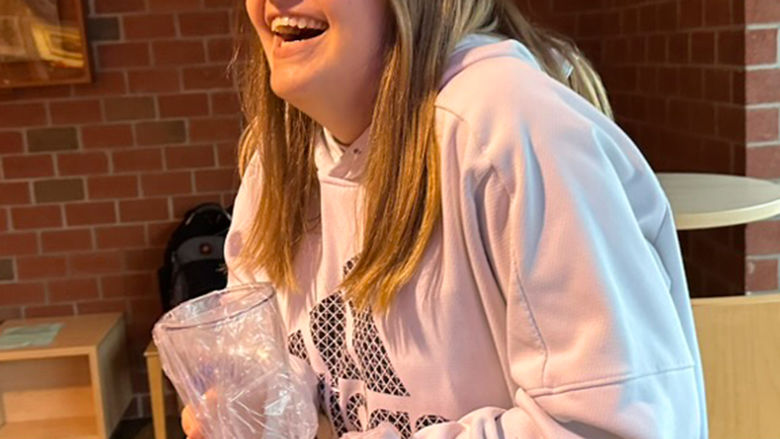 Sidney Brown enjoys her victory at the Honors Program Jeopardy night.
