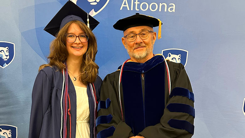 Honors graduate Kathryn Maille (left) with Dr. Doug Page.