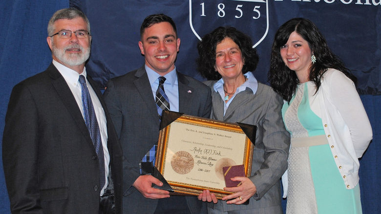Austin (AJ) Fink accepting Walker Award