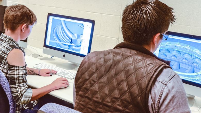 students design 3D models on computers